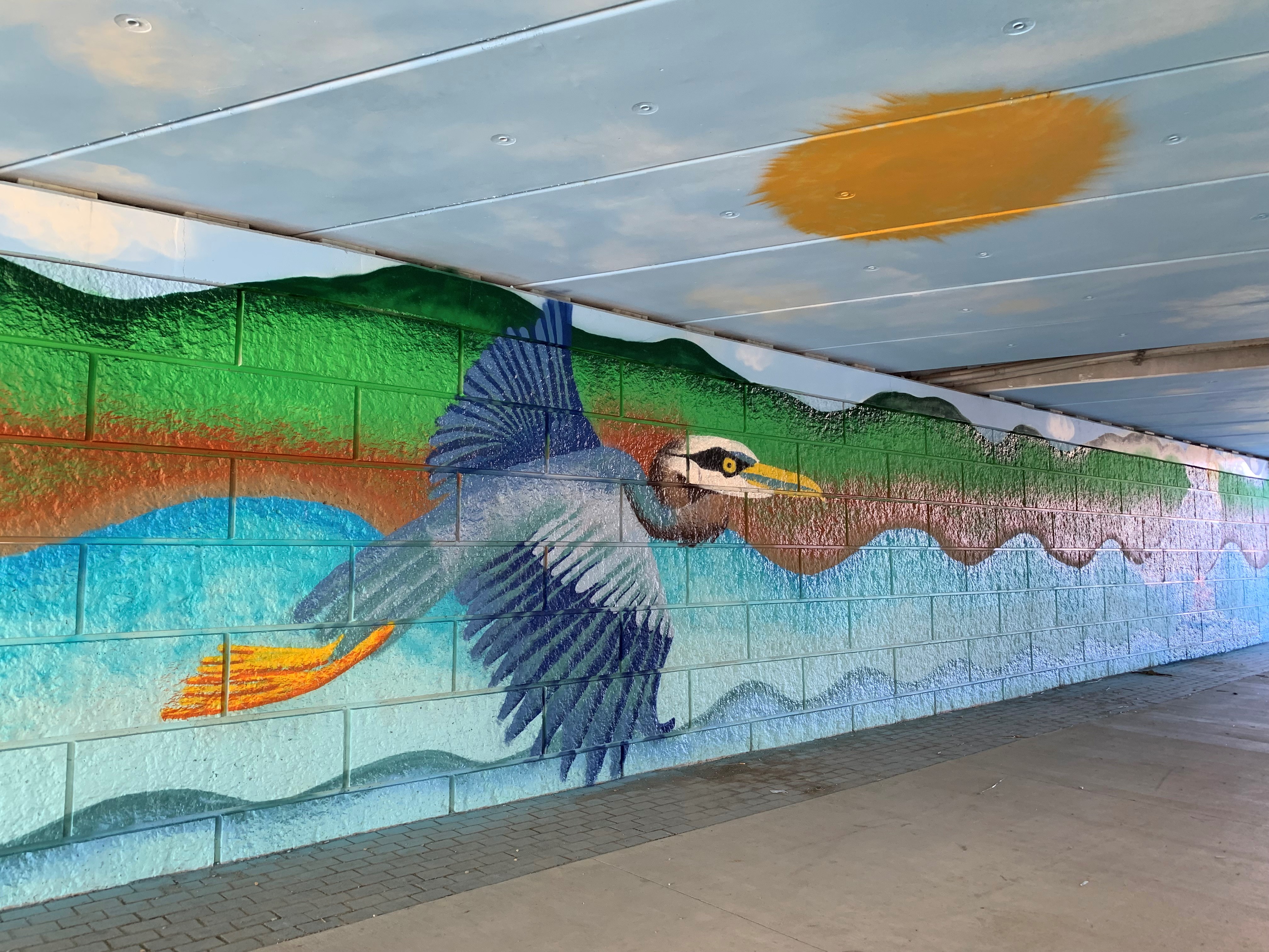Mural of heron underneath the Harrison Avenue bridge